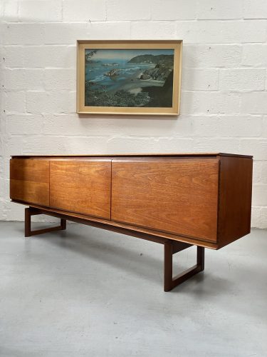 A fantastic linear teak sideboard designed by Philip Hussey for White & Newton of Portsmouth, circa 1967.