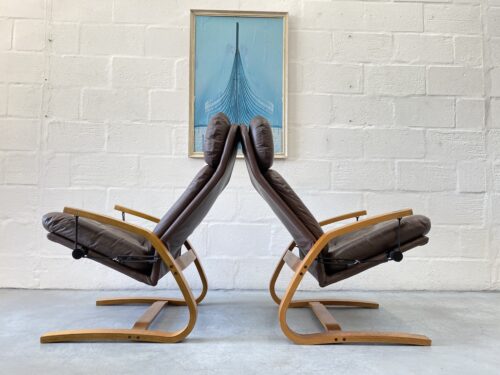1970s Retro Pair of Leather Reclining Chairs with Footstools