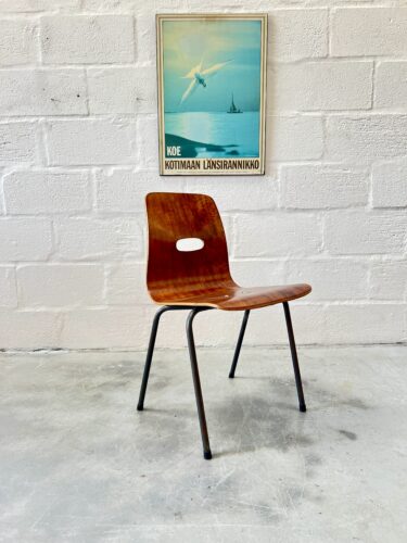 A Single Q Stak Chair Designed by Robin Day, 1954